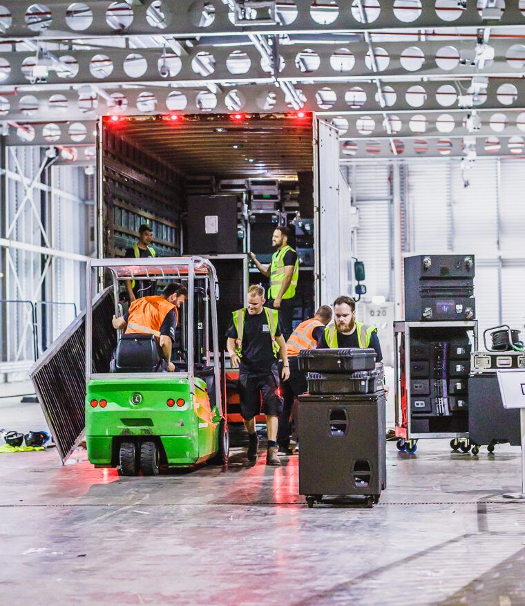 crew_unloading_lorry_with_forklift